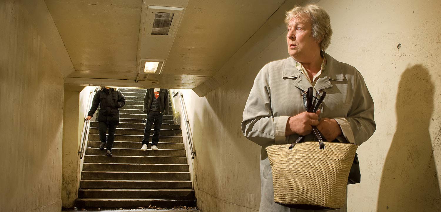 women being followed by two boys